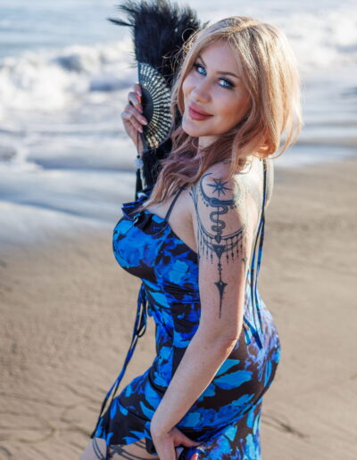 Violet Jolie tantric massage Newport Beach blue floral dress ocean